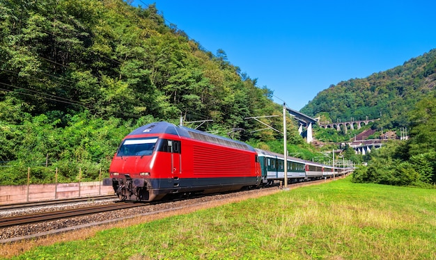 Passenger train going down the Gotthard pass in the Swiss Alps