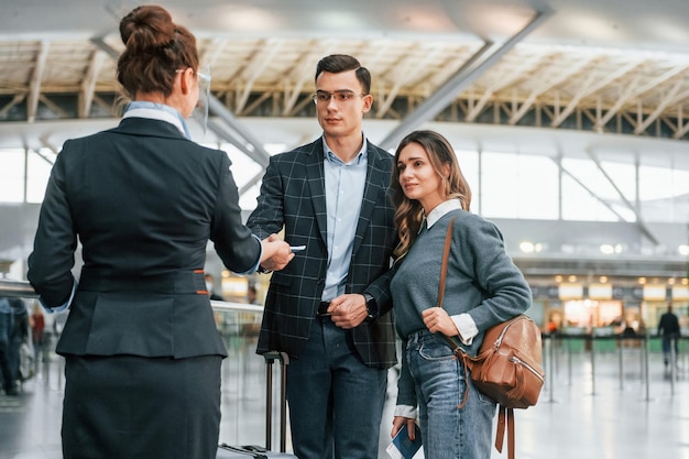 Passing procedure Young couple is in the airport together