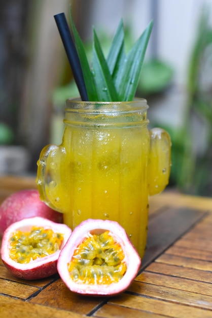 Passion Fruit tea on a wooden table closeup