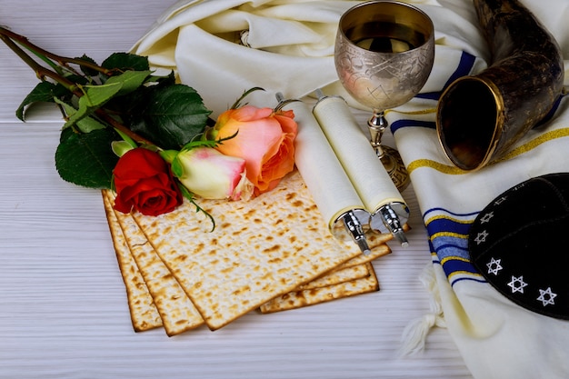 Passover holiday concept with wine and matzoh over background