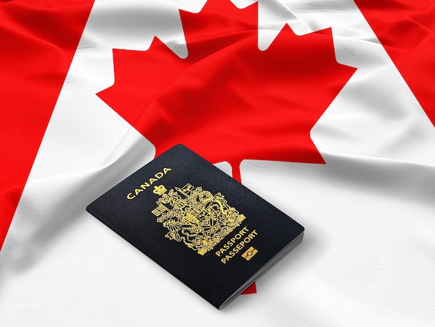 passport of Canada on the top of an satin canadian flag