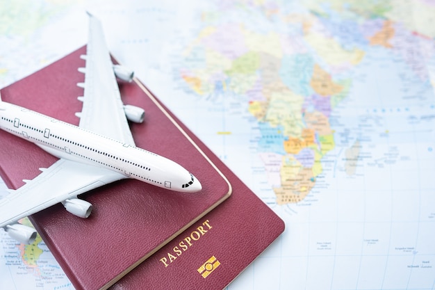 Photo passport with a map on old wooden background.travel planning.