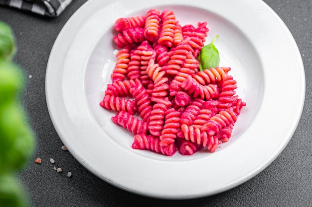 pasta beet sauce vegetable fusilli beetroo fresh food meal snack vegetarian food on the table