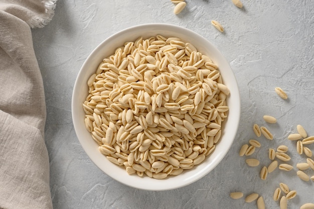 Pasta Cavatelli in white plate on gray