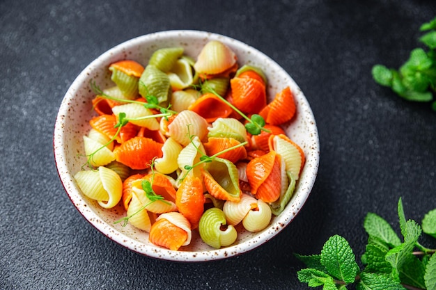 Pasta conchiglie boiled colorful garnish ready to eat durum wheat healthy meal food snack