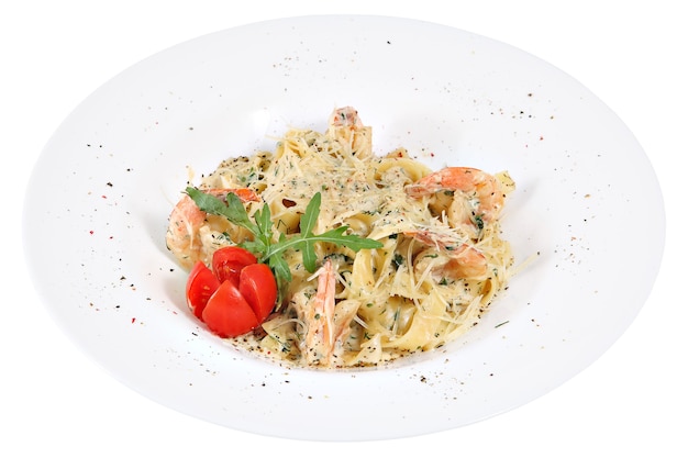 Pasta fettuccine with shrimps on white plate, isolated on white background.