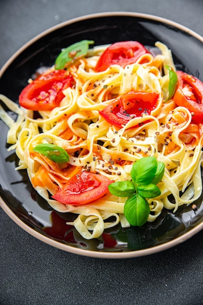 pasta fresh tomato tagliatelle meal food snack on the table copy space food background rustic