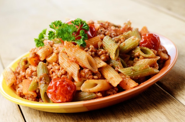 Pasta penne with bolognese