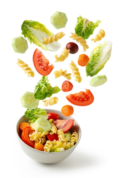 Pasta salad flying in bold, healthy food,