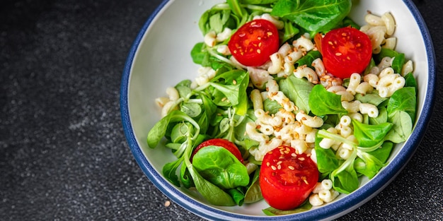 pasta salad tomato, vegetables second course healthy meal food snack diet on the table copy space