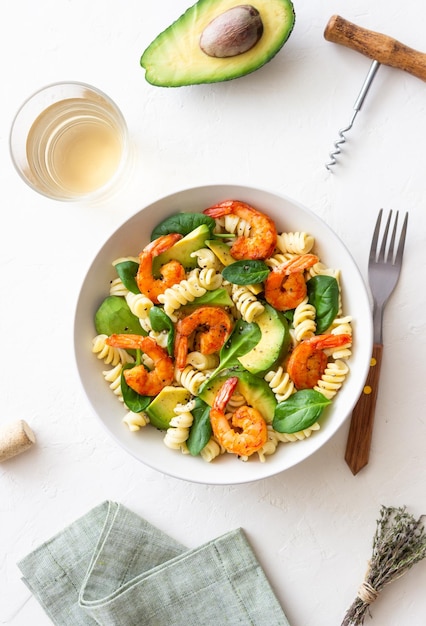 Pasta salad with shrimps avocado and spinach Healthy eating Seafood