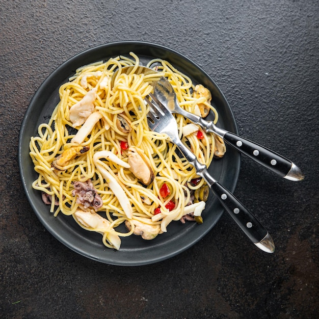 Pasta seafood spaghetti healthy meal snack on the table copy space food background