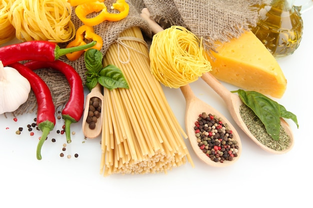 Pasta spaghetti, vegetables and spices, isolated on white