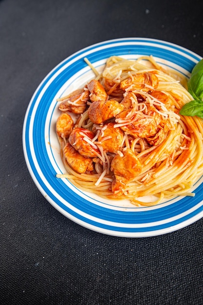 pasta spaghettitomato sauce chicken meat  fresh healthy meal food snack diet on the table