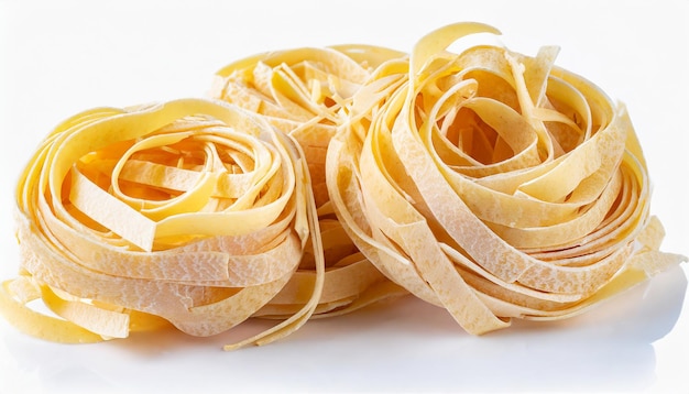 Photo pasta tagliatelle isolated on white background raw pasta italian food