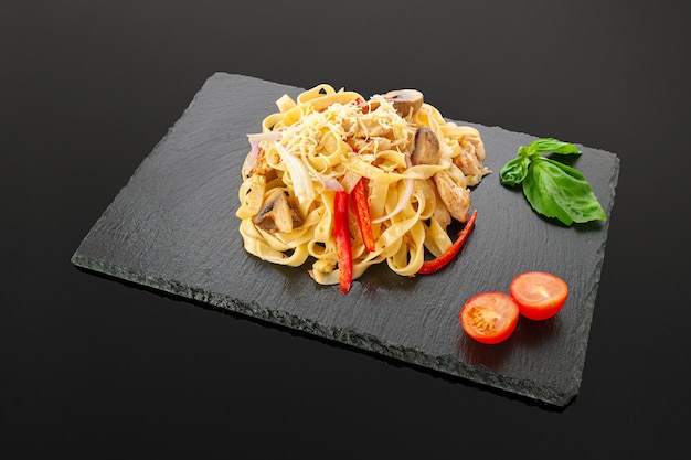 Pasta with chicken fillet and vegetables