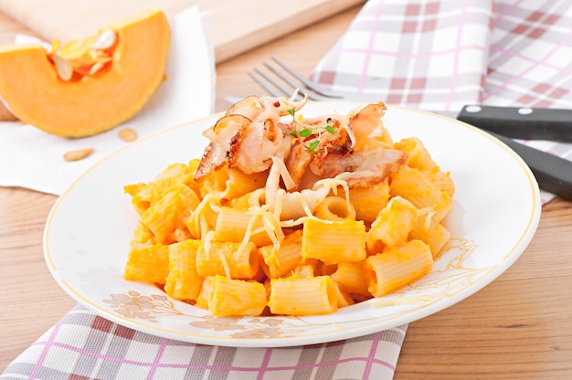 Pasta with pumpkin, liquor and bacon