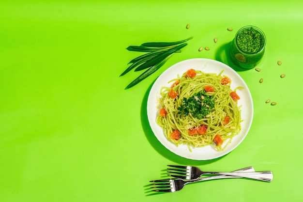 Pasta with salmon wild leek pesto and parmesan Fresh spaghetti and greens Healthy vegan food