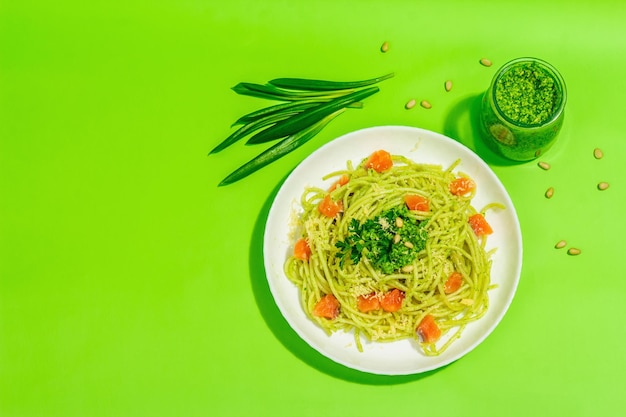 Pasta with salmon wild leek pesto and parmesan Fresh spaghetti and greens Healthy vegan food