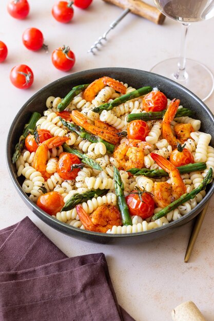 Pasta with shrimp asparagus and tomatoes Healthy eating Diet