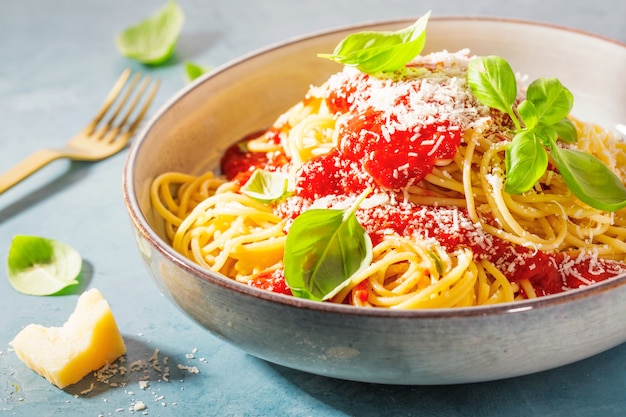 Pasta with tomato sauce and parmesan