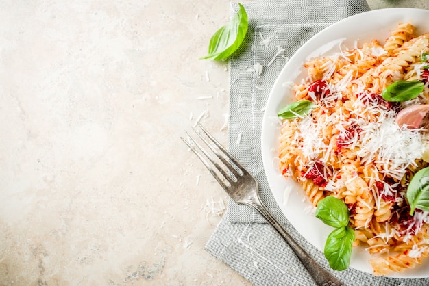 Pasta with tomato sauce and parmesan 