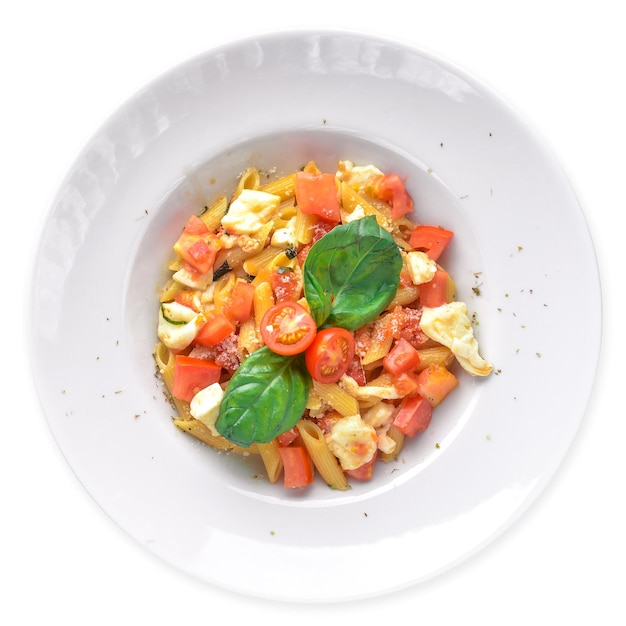 Pasta with vegetables, basil and Parmesan cheese. Italian food. Isolated.