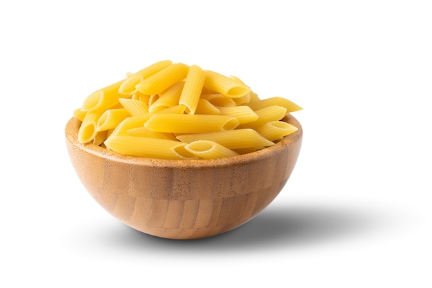 Pasta in a wood bowl isolated on white background