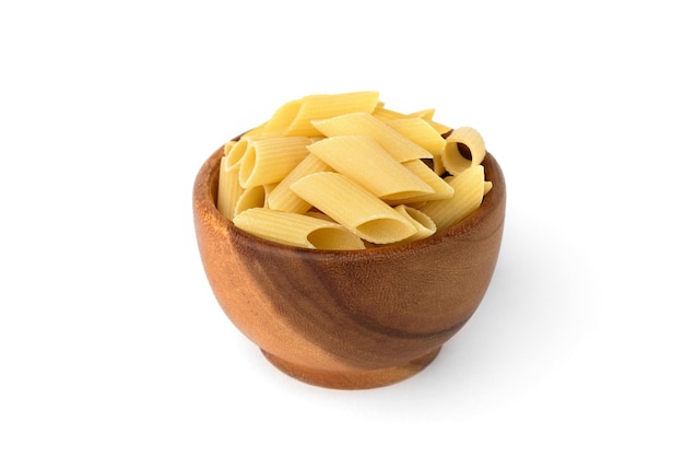 Pasta in wooden bowl isolated on white background.