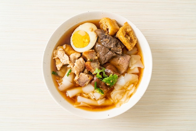 paste of rice flour or boiled Chinese pasta square in clear soup