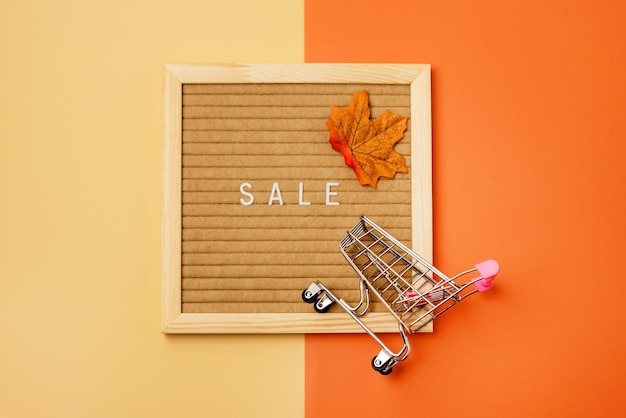 Pastel Autumn Colors Letterboard with Message SALE on Yellow and Orange Background Shopping