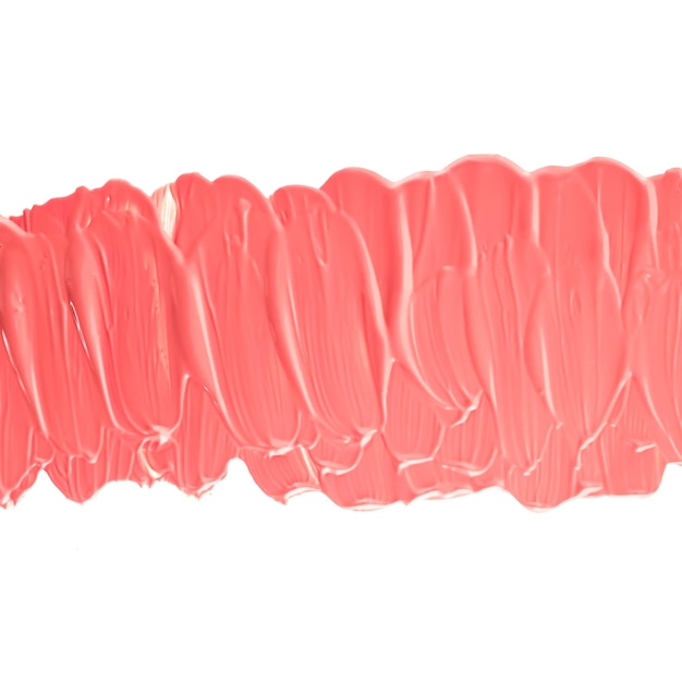 Pastel coral beauty swatch skincare and makeup cosmetic product sample texture isolated on white background makeup smudge cream cosmetics smear or paint brush stroke