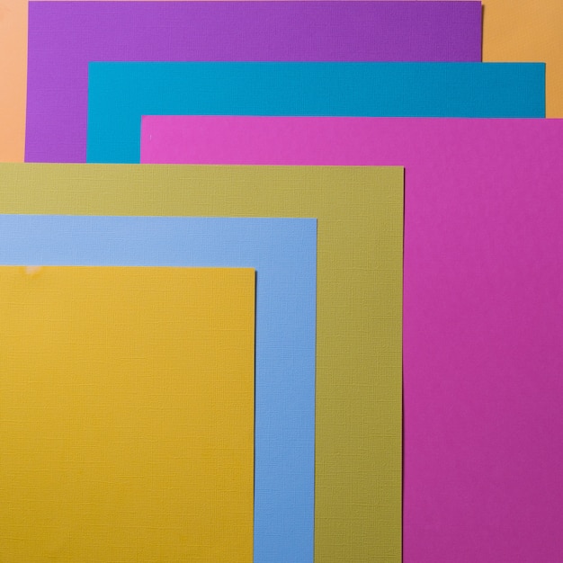 Pastel creative colors paper background, view from above.