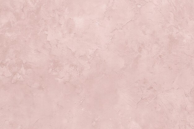 Pastel pink rough concrete textured background