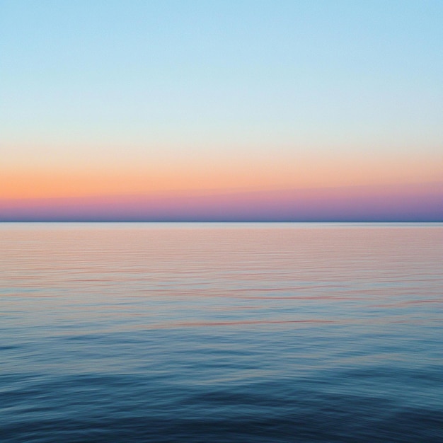 Photo pastel sunset over calm sea