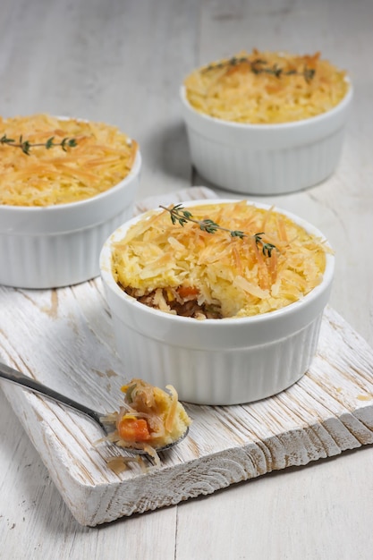 Pastel Tutup (Shepherd's Pie) is Traditional British pie, made from mashed potato and minced beef.