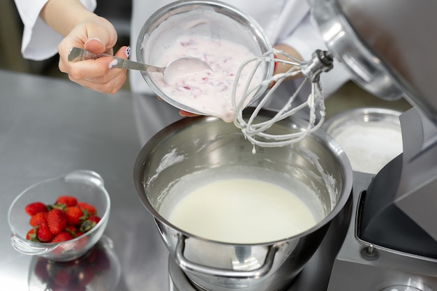 Pastry chef cooking in the kitchen