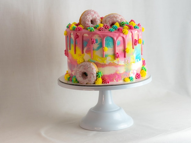 Pastry chef designer making a football soccer ball as a frosted cake topper