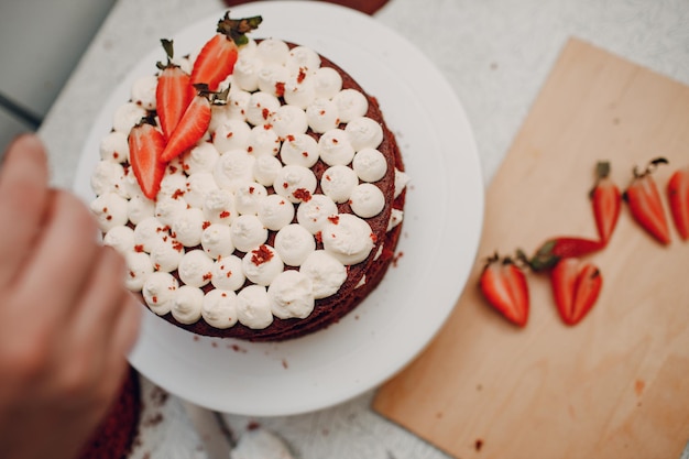 Pastry chef makes delicious red velvet cake Cooking and decorating dessert