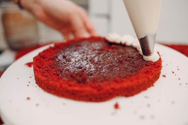 Pastry chef makes delicious red velvet cake Cooking and decorating dessert