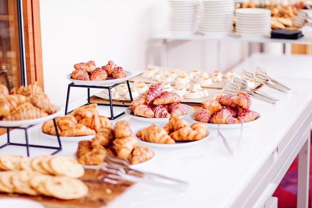 Pastry cookies and croissants sweet desserts served at charity event  food drinks and menu concept as holiday background banner for luxury brand design