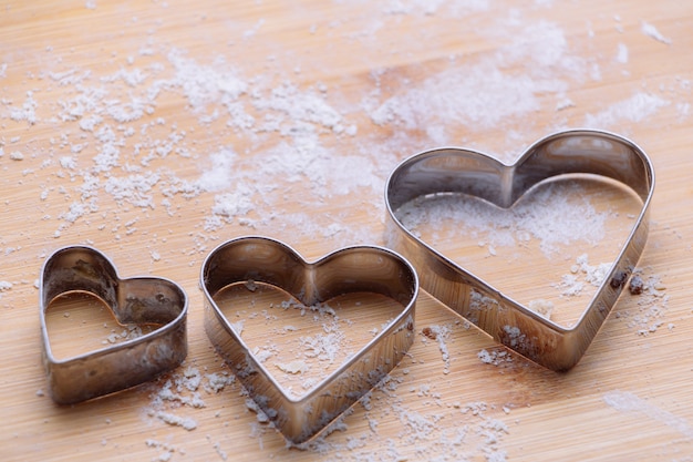 Pastry cutter on wooden board