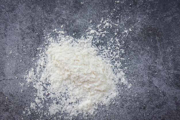 Pastry flour on gray   homemade flour for cooking ingredients on kitchen table