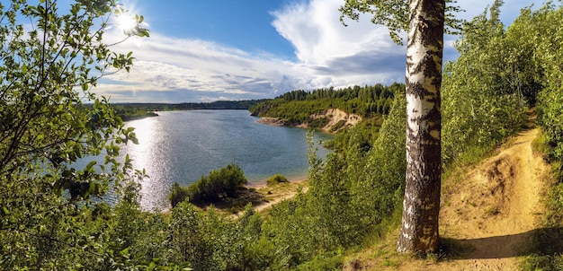 A path along the lake on the high shore