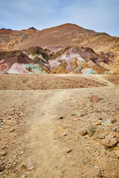 Path leading to colorful mountains in death valley