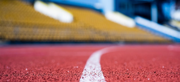 Path for runners racetrack on outdoor stadium stadium arena soccer field healthy sports life treadmill in gym running track in selective focus finish line health and sport