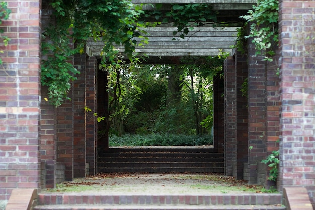 A path with a shelter in the botanical garden in the city of Poznan, Poland