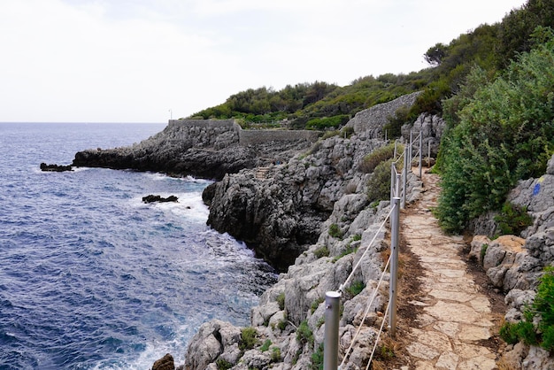 Pathway fence customs path by the sea beach mediterranean coast at Antibes JuanlesPins in France