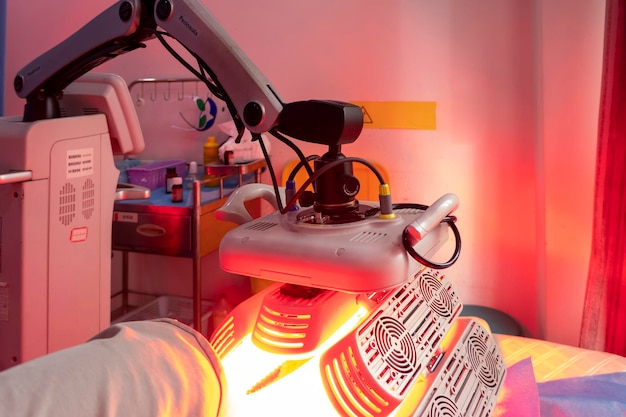 The patient is undergoing infrared light therapy for the nervous system