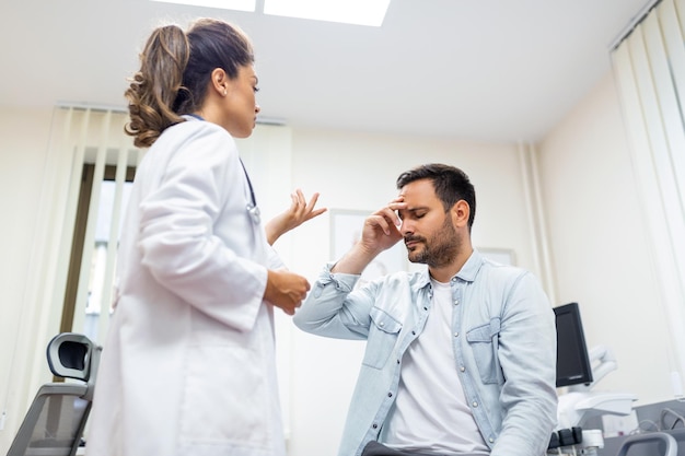 Patient receiving bad news he is desperate and sad Doctor support and comforting patient with sympathy Don't worry this medical test is not so bad